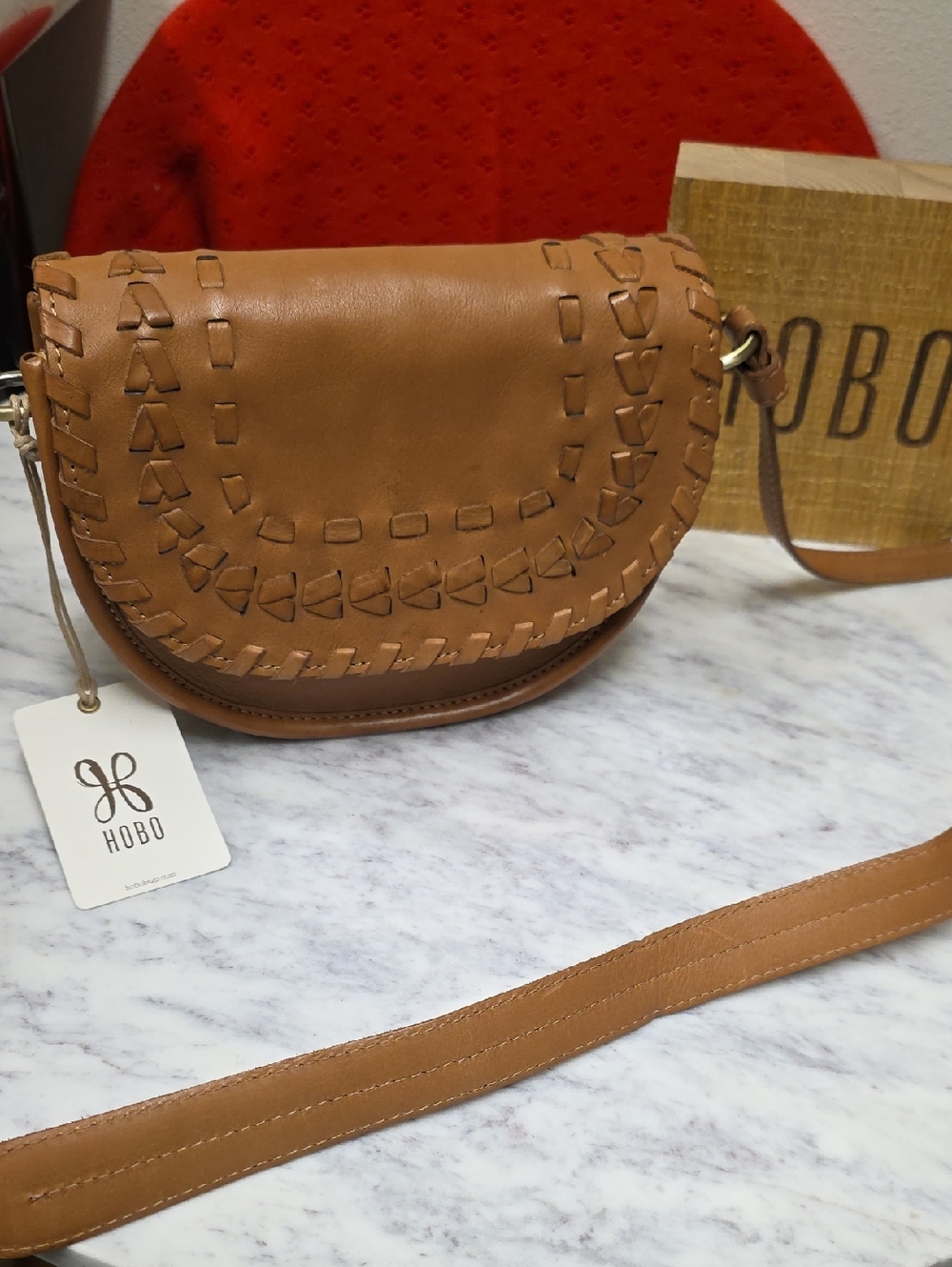 HOBO Kiva Small  Cognac Leather Woven Saddle Crossbody Bag